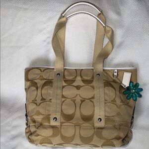 Coach - F18855- Beige Signature Tote with Teal Charm & Violet Interior